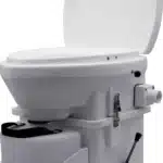 Nature’s Head composting toilet installed in a tiny house bathroom