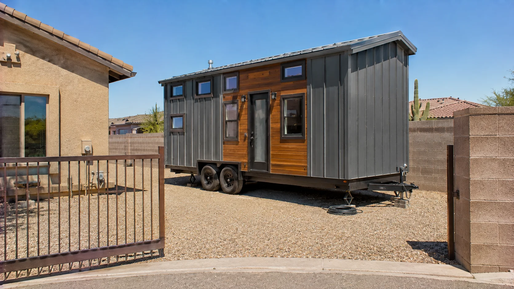 Tiny house on wheels parked on residential property in Arizona
