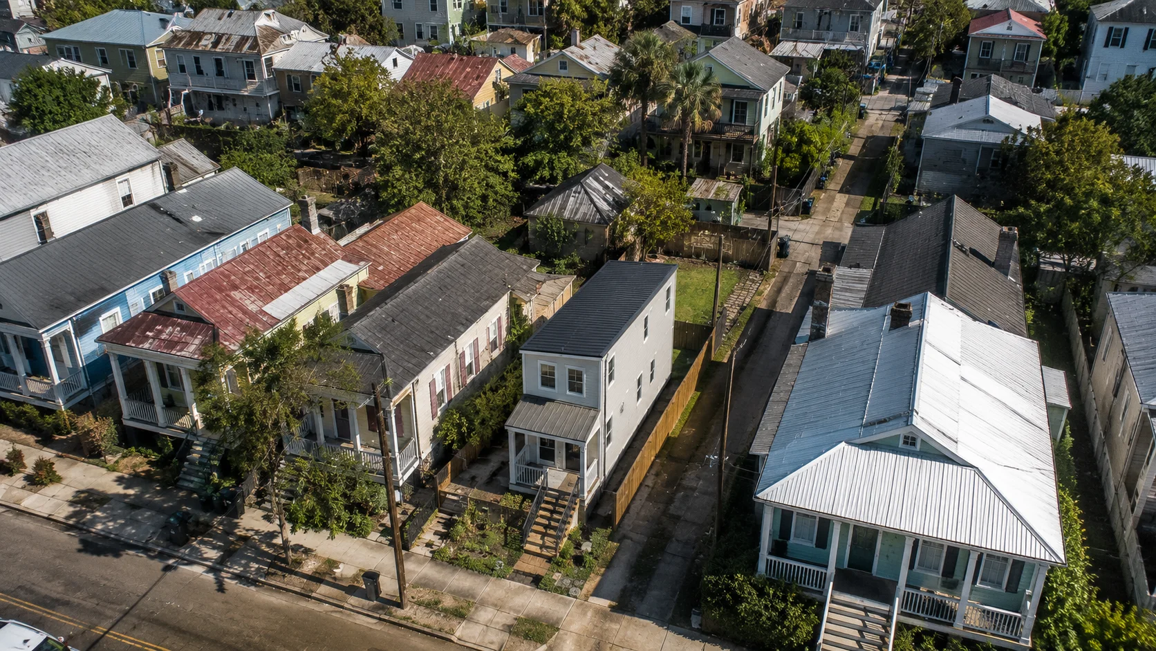 Tiny house on a narrow lot in a Louisiana neighborhood
